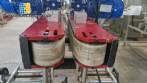 Automatic double head labeling machine for flat bottles Bauch Campos