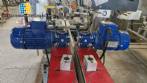 Automatic double head labeling machine for flat bottles Bauch Campos