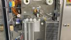 Tetra Pak A3 aseptic filling machine with cardboard packer 70 and tray shrink 51.