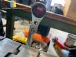 Automatic self-adhesive labeling machine for cylindrical bottles
