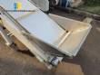 Inclined conveyor belt with talisca