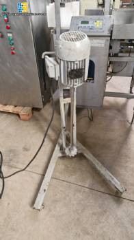 Column mixer agitator with Cowles-type disc