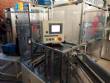 Vertical cartoning machine