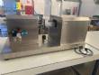 Cetro benchtop ultrasonic tube and pipe filling and dosing machine.