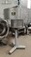 Complete filling line with Tecman Nelpas Tecnoenvase Tudela bottle filling, labeling, capping, and positioning machines for cosmetic liquids.