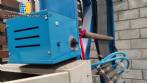 Complete line for manufacturing plastic bags and sacks