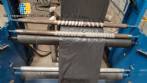 Complete line for manufacturing plastic bags and sacks