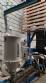 Complete line for manufacturing plastic bags and sacks