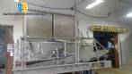 Treadmill with silo and vibrating gutter