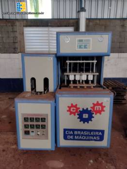 Semi automatic PET bottle blower with 4 cavities