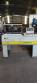 L-shaped sealer with shrink tunnel for packaging packages Smipack