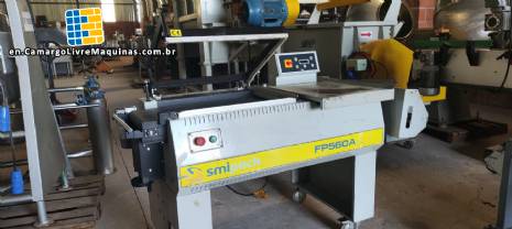 L-shaped sealer with shrink tunnel for packaging packages Smipack