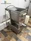Stainless steel meat grinder with size 98 opening.