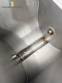 Stainless steel meat grinder with size 98 opening.