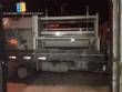 Shrink wrapping machine carpet sealer