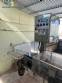 Packaging line with IMSB bung capper, Maqmundi labeler and accumulator table