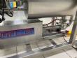 Unifiller stainless steel dosing pump with homogenizing mixer for bakery foods.