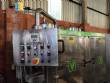 Gravimetric rotary filling machine in stainless steel with cabin
