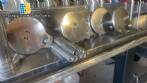 Gravimetric rotary filling machine in stainless steel with cabin