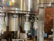 Gravimetric rotary filling machine in stainless steel with cabin