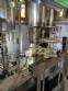 Gravimetric rotary filling machine in stainless steel with cabin