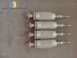 Erli rotary liquid filling machine with 4 pistons, 14,400 units per hour.