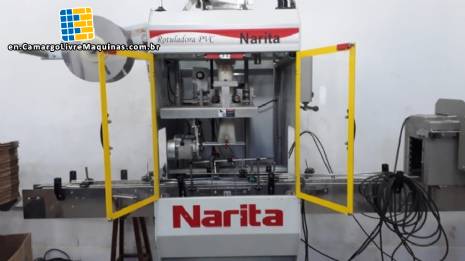 Automatic sleeve labeler