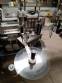 Automatic labeler for flat bottles
