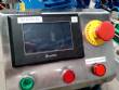 Automatic labeler for flat bottles