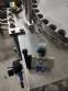 Bottle screw filler with 3 nozzles