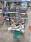 Vertical wrapping machine for triangular format