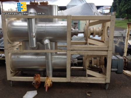 Industrial cooker for sweets with scraper