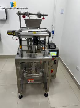 Automatic volumetric dosing packaging machine for powder products.