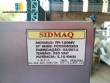 Tempering machine with cover plate coupled to Sidmaq