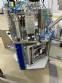 Rotary filling machine with Bramak aa jar capping sealer