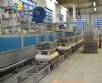 Tunnel kiln with trolleys for firing ceramic tiles