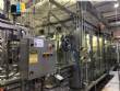 Rotary filling machine for bottles with aluminum seals
