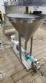 Netzsch positive displacement helical sanitary pump with feed hopper.
