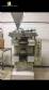 Packing and filling machine for sachets