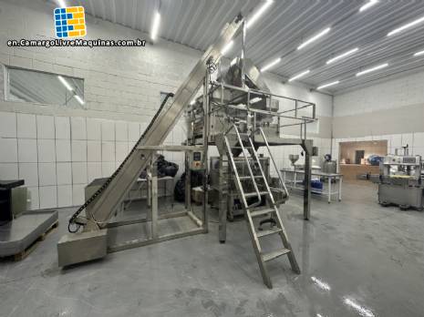 Multi-head packaging machine for pots and flasks