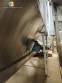 Stainless steel bagging storage silo with screw conveyor outlet
