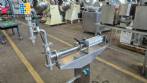 Semi-automatic stainless steel liquid filling machine with 1 nozzle.