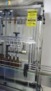 Linear filling machine with 4 stainless steel nozzles