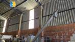 Inclined screw conveyor with stainless steel silo