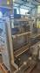 Filling machine for sachet with two dosers