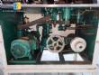 Labeling machine for cylindrical bottles