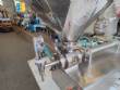 Countertop stainless steel filling machine for liquids and viscous liquids