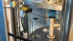Automatic rotary dosing and sealing filling machine for cups, jars, and bottles, Milainox MB-1