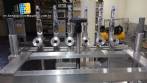 Linear filling machine with 6 pistons filling system