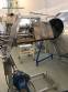 Rotary industrial roaster for roasting grains